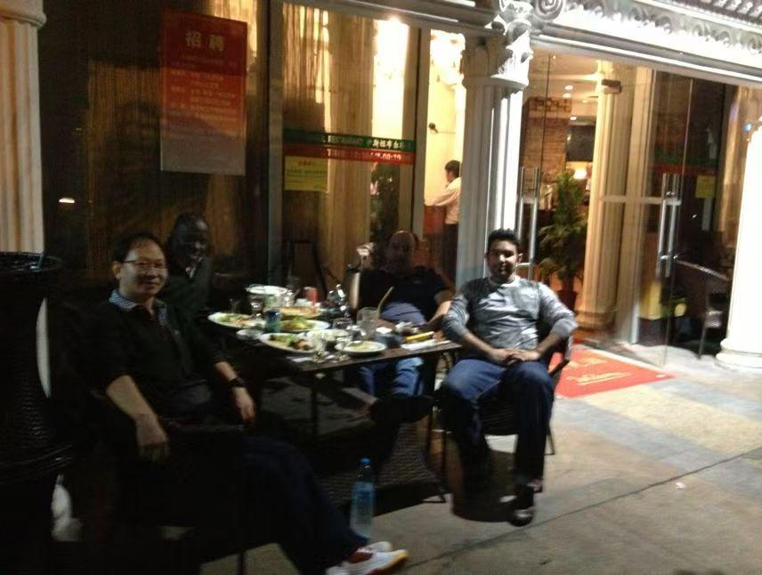 DongXin team meeting with customers during a project visit