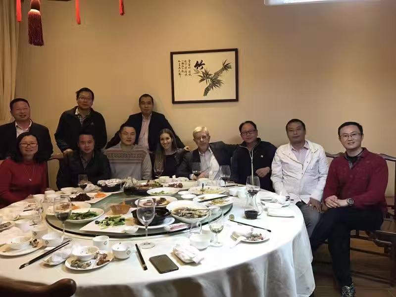 DongXin team and customers sharing a business dinner